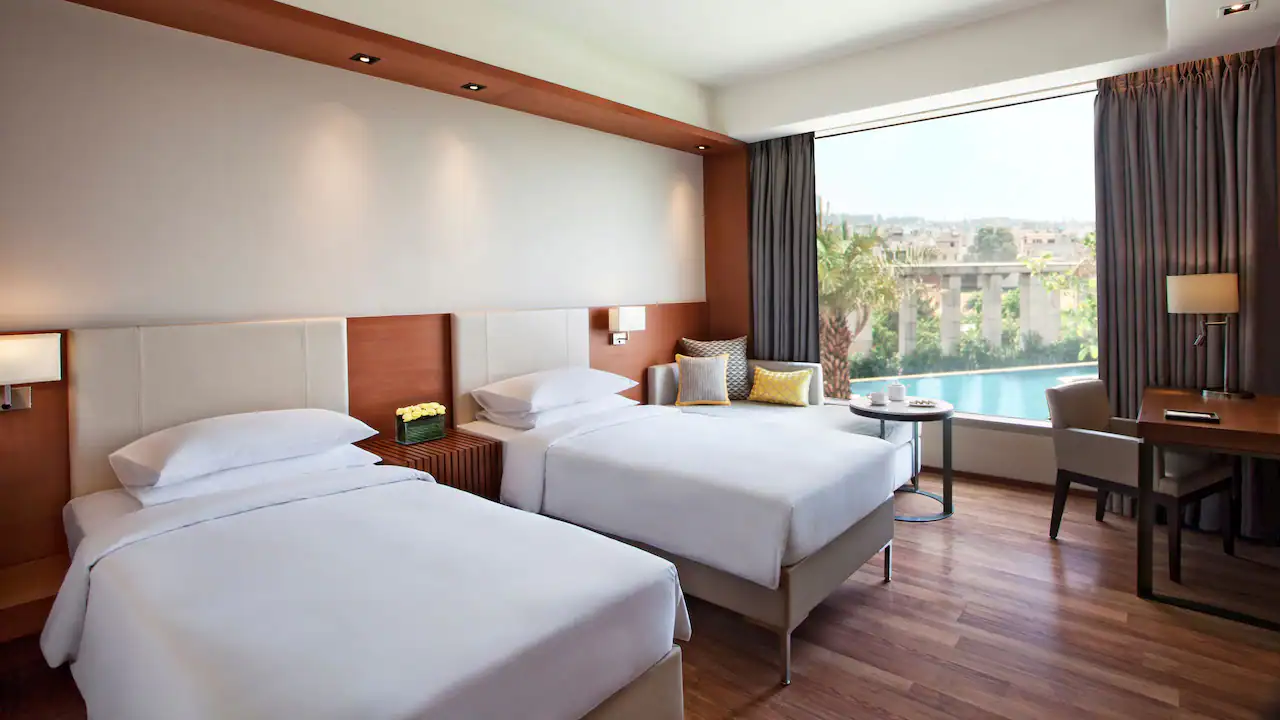 Twin Bedroom with Pool View